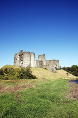 Fototapeta premium Kidwelly Castle, Kidwelly, Carmarthenshire, Wales, UK is a ruin of a 13th century medieval castle