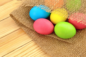 Obraz na płótnie Canvas Photo painted in different colors Easter eggs