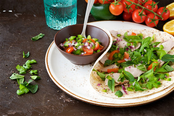 Meat fajita with arugula, cilantro, mint and salsa 