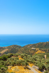 Naklejka na ściany i meble A rough cretan landscape during a sunny summer day, Crete, Greec