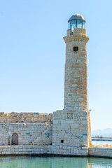 Old venetian lighthouse in city of Rethymno, Crete, Greece..