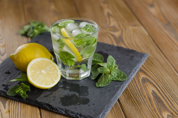 Fresh lemon water with mint and ice