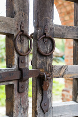 old wooden lattice on the gates