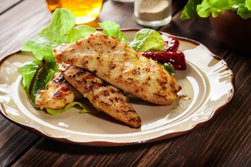 Grilled chicken breasts served with grilled paprika