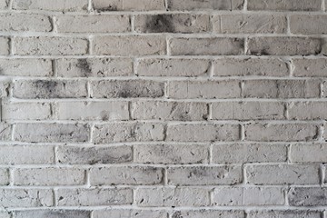 Grey old brick wall.