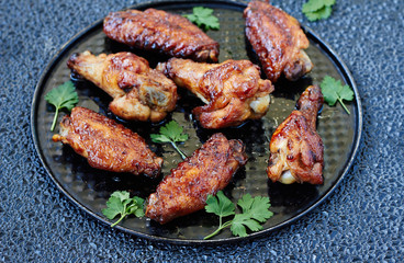 Teriyaki chicken wings:glazed wings in sauce