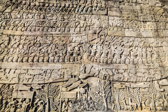 Historic Khmer bas-relief showing Hindu legend scenes at Bayon temple