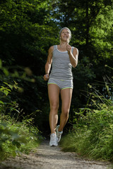 Obraz na płótnie Canvas Frau Joggen Jogging Natur Fitness