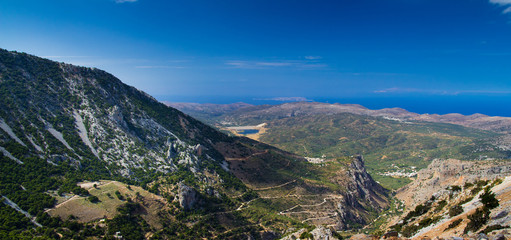Mountains of the island of Crete and winding road. The view from the pass