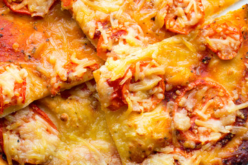 Pizza with ham, pepper and olives.