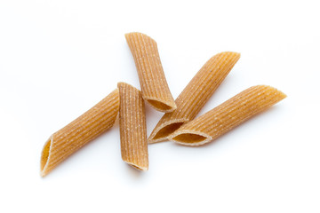 Rye flour macaroni pasta close up isolated on white.