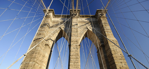 detail of Brooklyn Bridge with blue sky, New York City, USA