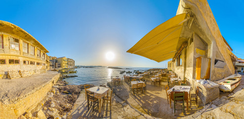 Traditional greek tavern by the sea in Chania, Greece