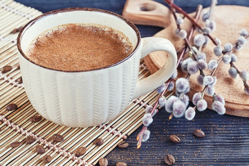 Cup of cappuccino with cinnamon