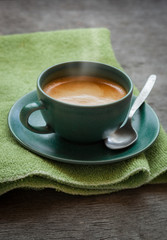 Coffee in a green cup,shallow depth of field