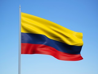 Colombia 3d flag floating in the wind with a blue sky background 