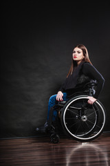 Fototapeta na wymiar Sad woman sitting on wheelchair