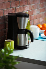 Coffee machine on the kitchen table, close up