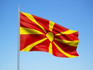 Macedonia 3d flag floating in the wind with a blue sky background 