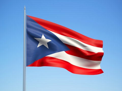 Puerto Rico 3d flag floating in the wind with a blue sky background