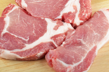 Raw meat steaks