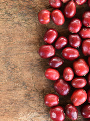 Close up of fresh coffee beans on wooden backgourng