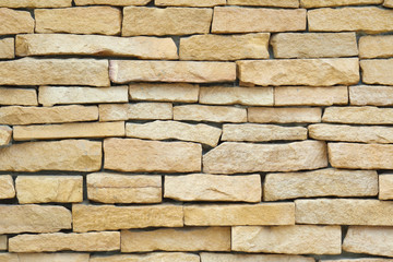 Exterior brown brick wall, textured wall background.