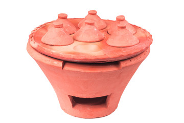 Traditional stoves and pots set made of red clay for make Kind of Thai sweetmeat. Coconut milk mix with powder fried dessert
