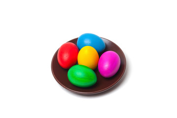 Colored eggs on a plate. Easter eggs.