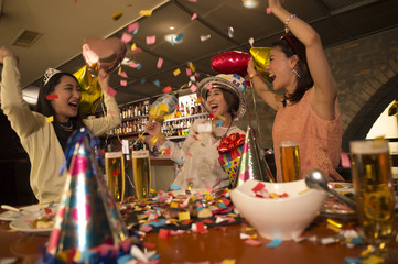 Birthday party confetti is flying