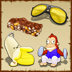 Play set of banana, toys, sweets and sunglasses