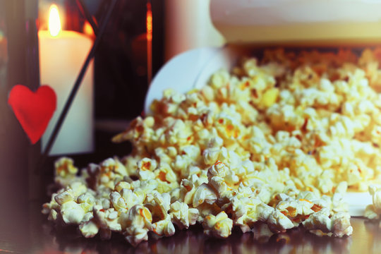 popcorn basket near candle