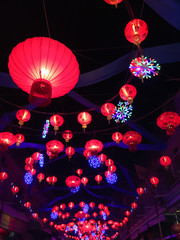 Chinese red lanterns hanging in street at night during the Chinese New Year's Day
