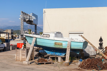 Old wooden yacht repairing, port of Ajaccio, Corsica