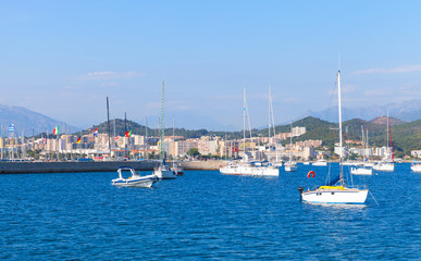 Obraz premium Sailing yachts and motorboats moored in port of Ajaccio