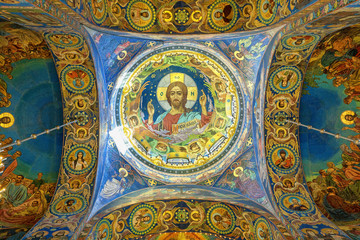 Mosaic of Christ Pantocrator under the central dome inside the Church of the Savior on Spilled Blood in St. Petersburg, Russia.