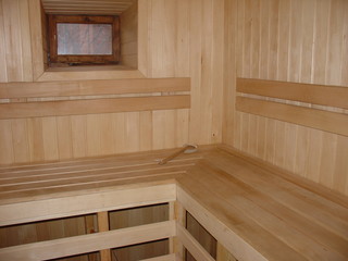 Fototapeta na wymiar Wooden sauna with a window.