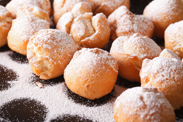Freshly fried donuts Castagnole macro. horizontal
