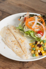 Clean food, Fish fillet steak with salad vegetables.