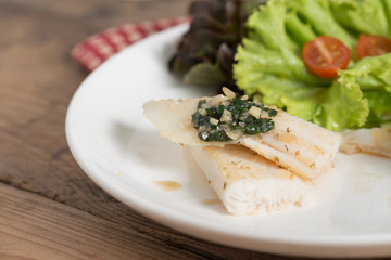 Clean food, Fish fillet with basil and garlic sauce.