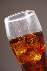 cola with ice closeup