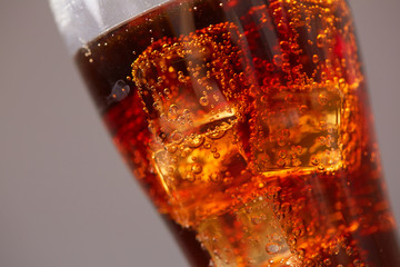 cola with ice closeup