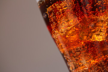 cola with ice closeup
