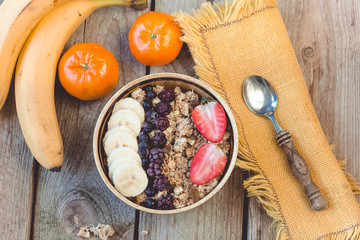 Bowl of healthy muesli and fresh berries