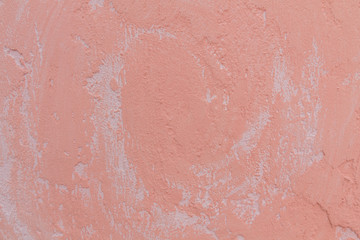 Fototapeta premium Pink plaster wall texture