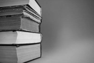 Stack of old books a black image