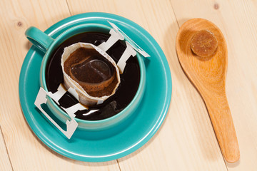 Drip bag fresh coffee in cup