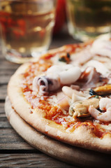 Italian traditional pizza with seafood