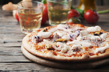 Italian traditional pizza with seafood