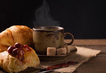 coffee cup and croissant